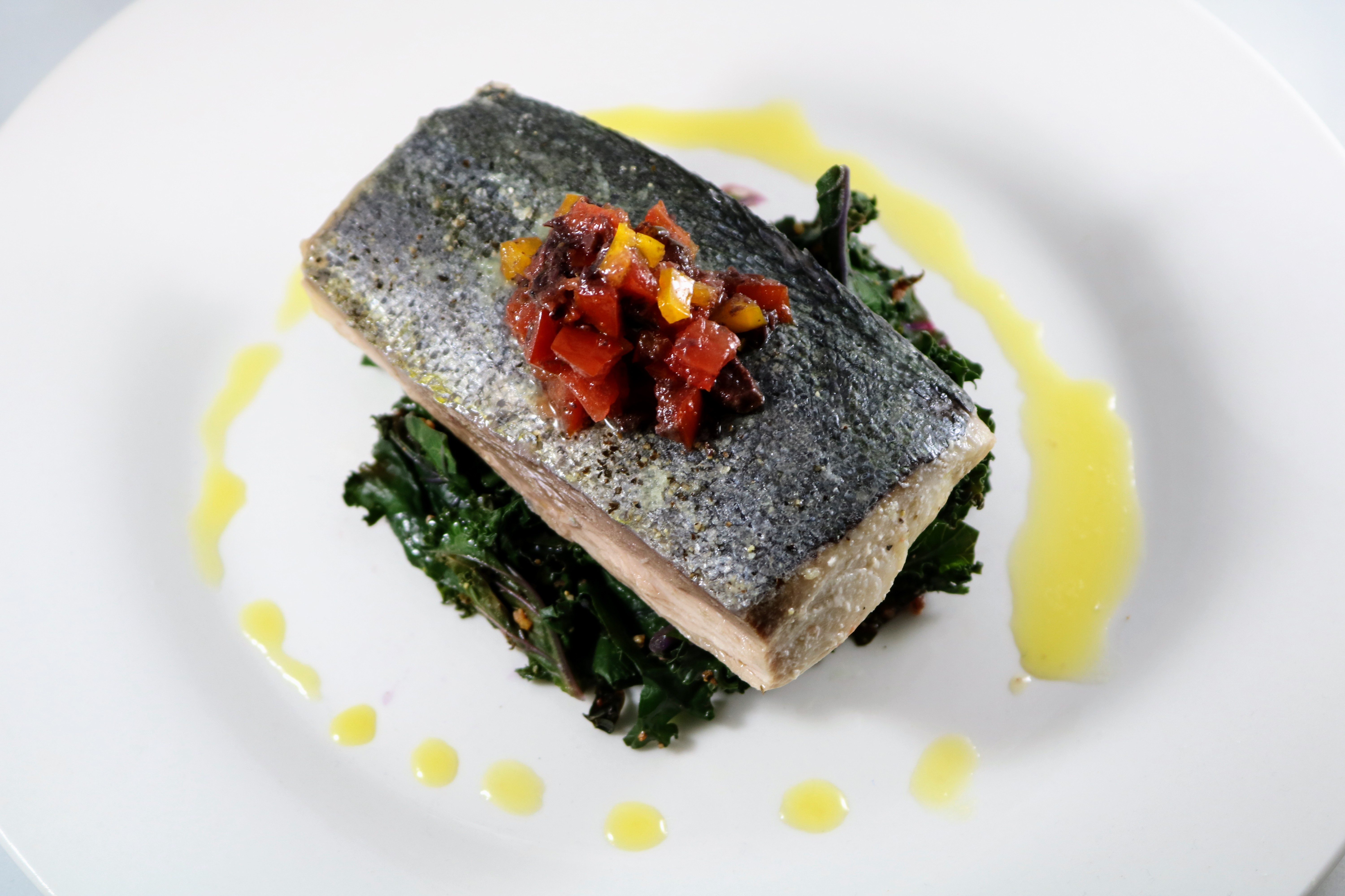 Ghee Poached Mahi-Mahi with Olives, Tomatoes, and Peppers